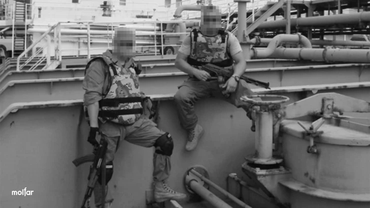 Two armed men, black and white photo
