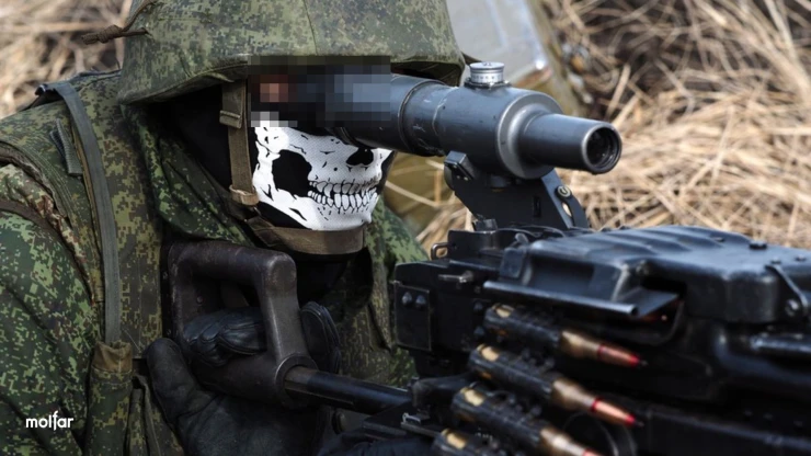 Man in Russian military uniform and balaclava